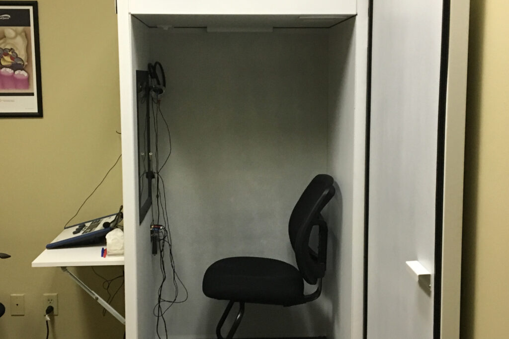audio testing booth with chair inside